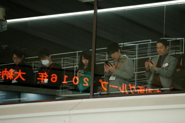 Shares in Asia fall on uncertainty over US immigration flap